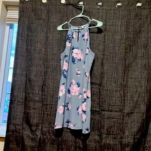 L grey dress with pink flowers and cut out v neckline